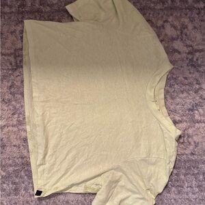 lululemon athletica Pale Yellow Short Sleeve Top w/ camo design on back